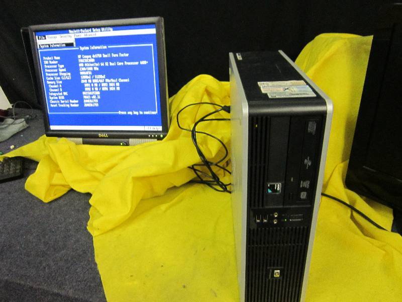 lot 215 image: Computer Tower, loads screen pictured, no further testing.  Tower only, SCREEN INCLUDED FOR DEMONSTRATION ONLY