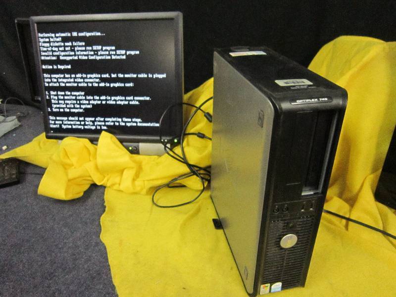 lot 216 image: Computer Tower, loads screen pictured, no further testing.  Tower only, SCREEN INCLUDED FOR DEMONSTRATION ONLY