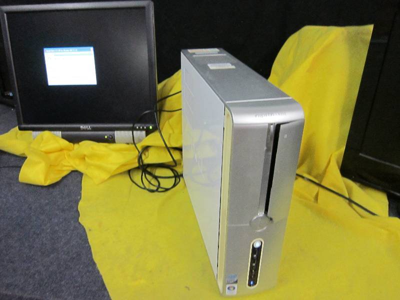 lot 218 image: Computer Tower, loads screen pictured, no further testing.  Tower only, SCREEN INCLUDED FOR DEMONSTRATION ONLY