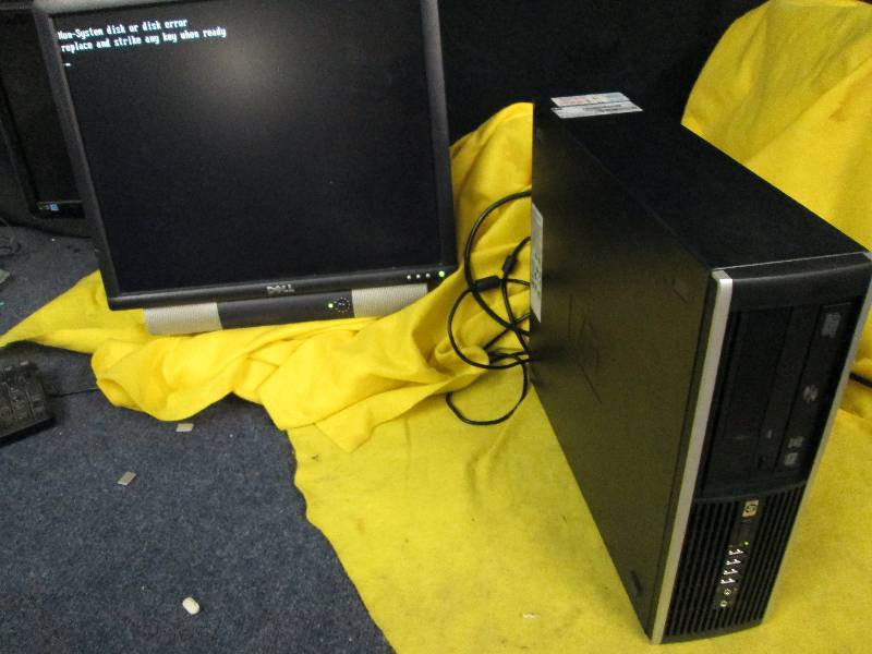 lot 219 image: Computer Tower, loads screen pictured, no further testing.  Tower only, SCREEN INCLUDED FOR DEMONSTRATION ONLY
