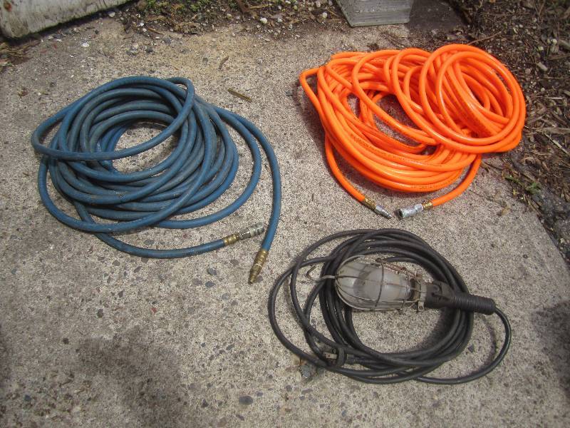 lot 55 image: Lot of 2 Air Hoses and a Work Light...