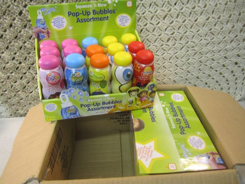 lot 184 image: Case of 30 Squeeze N Blow Pop-Up B...