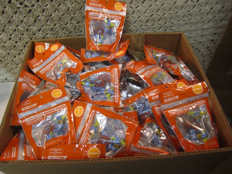 lot 185 image: 100 Skylanders Connective Gaming Fi...