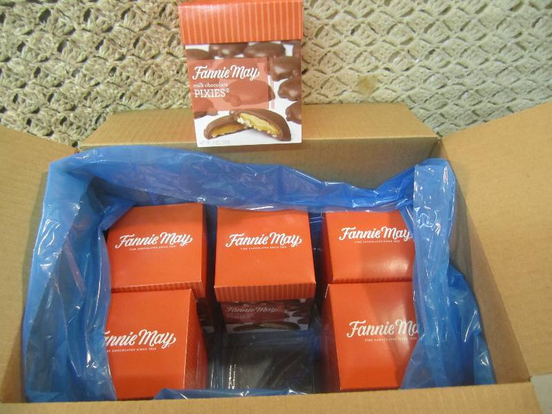 lot 249 image: Case of 6 Boxes Fannie May Milk Cho...