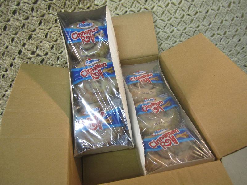 lot 264 image: Case of 6 Packs of 6 Hostess Cinnam...