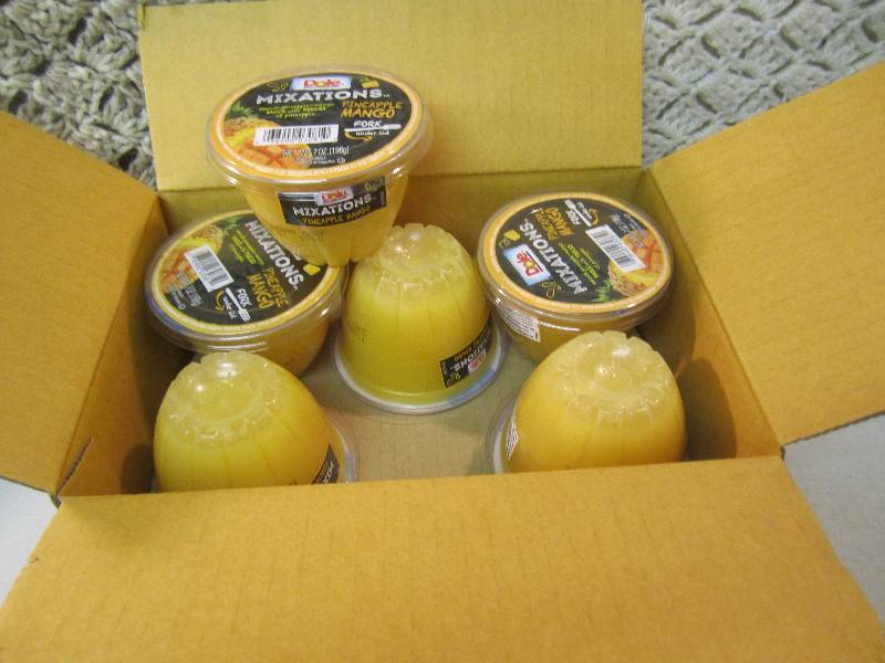 lot 328 image: Case of 12 Dole Mixations Pineapple...