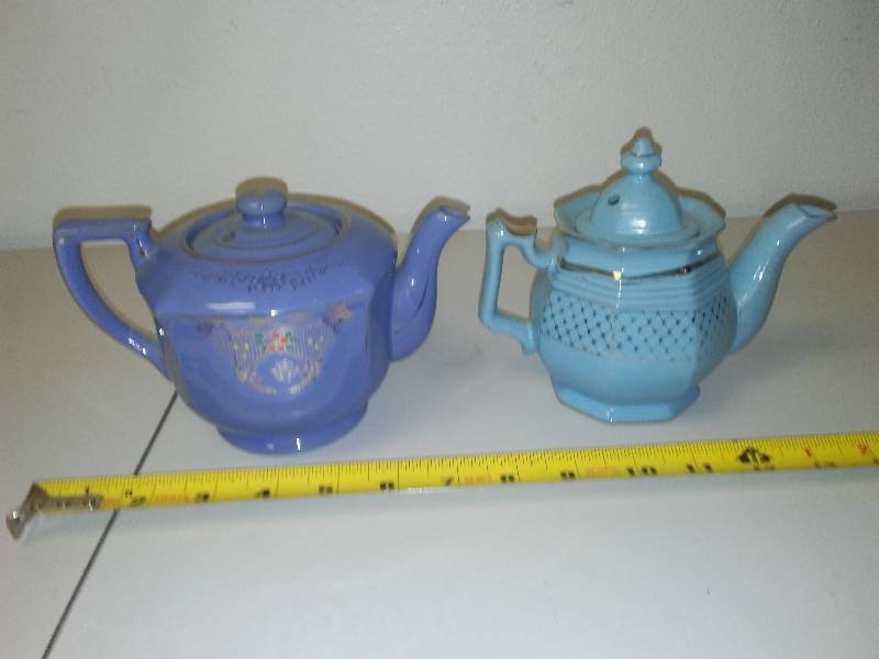 lot 81 image: blue teapots with gold accent (2)