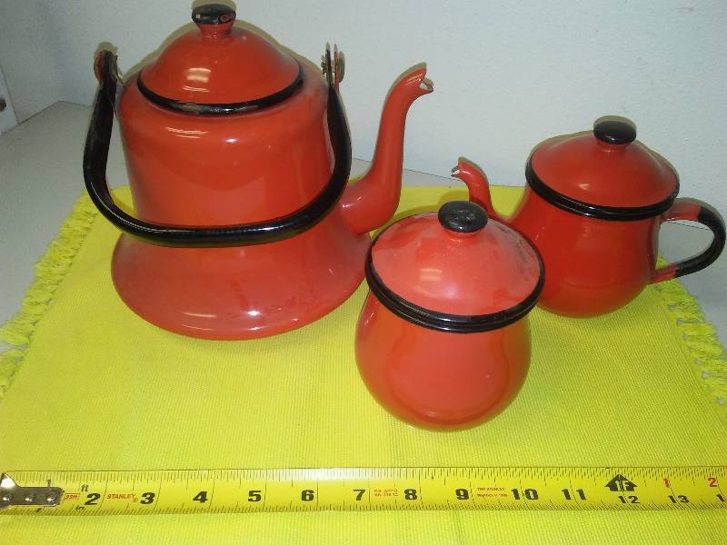 lot 100 image: enamel wear red teapots (3)