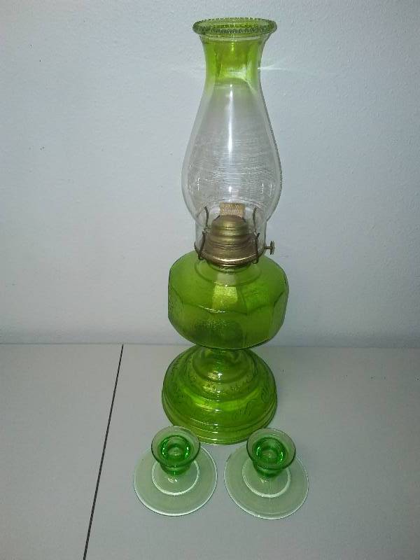 lot 103 image: Eagle green oil lamp and candle holders