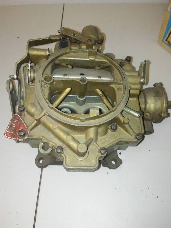 lot 124 image: GM 4-barrel carburetor