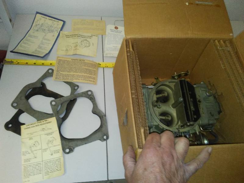 lot 147 image: Holley four barrel carburetor number 79930, new in box with gaskets, mounts and info, Econo Master by Holley possibly for a 7475 Ford