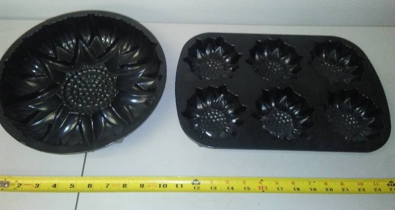 lot 167 image: Nordic  covered cast ornate baking pans