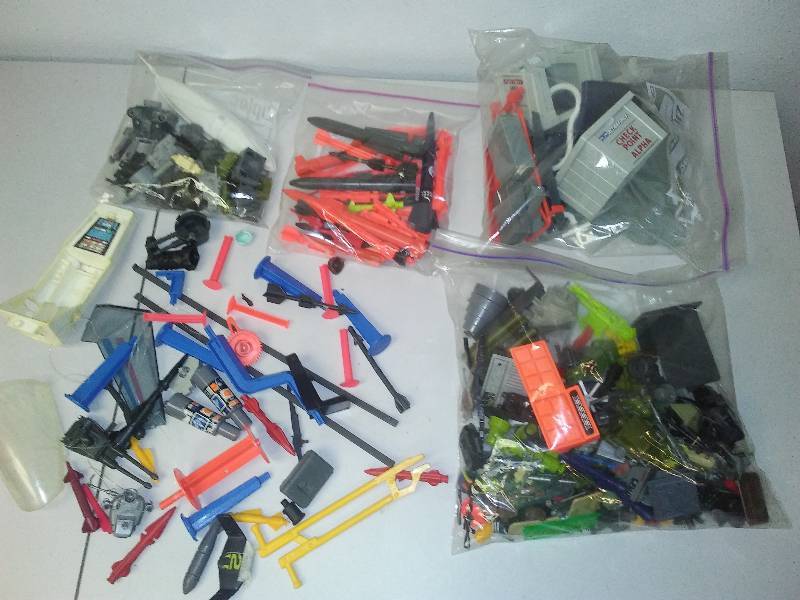 lot 192 image: G I Joe, backpacks, missiles, guns and more