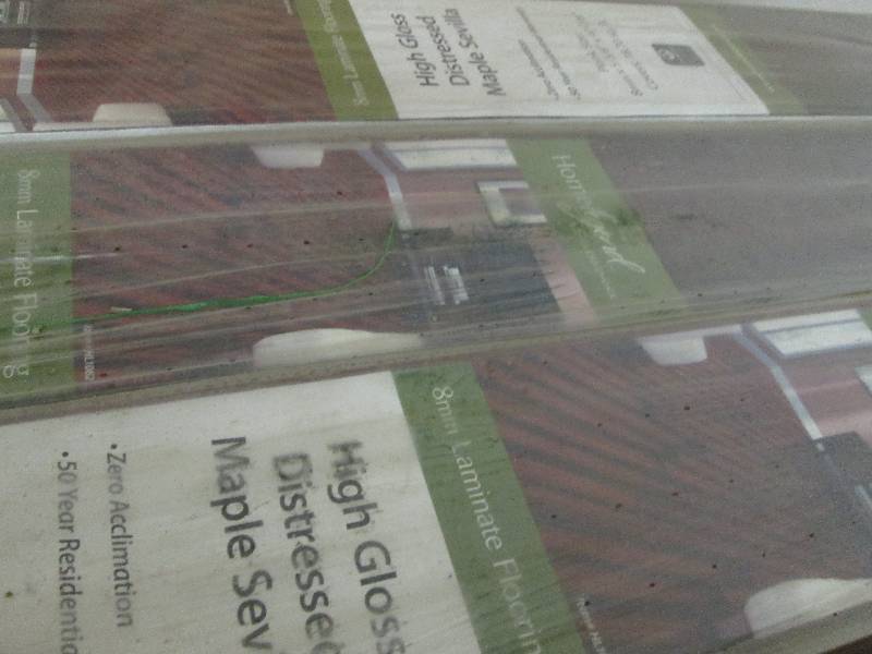 lot 15 image: 8 Cases Home Legend High Gloss Dist...