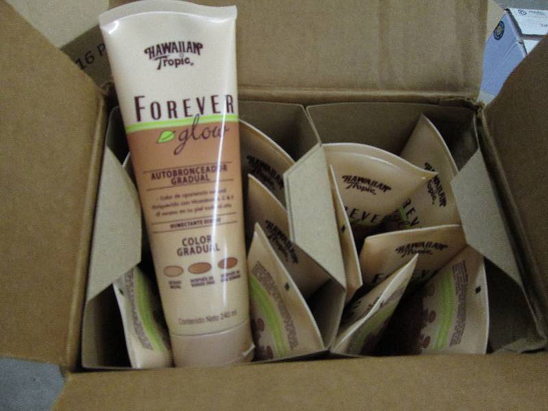 lot 115 image: 20 cases of 12 Hawaiian Tropic Fore...