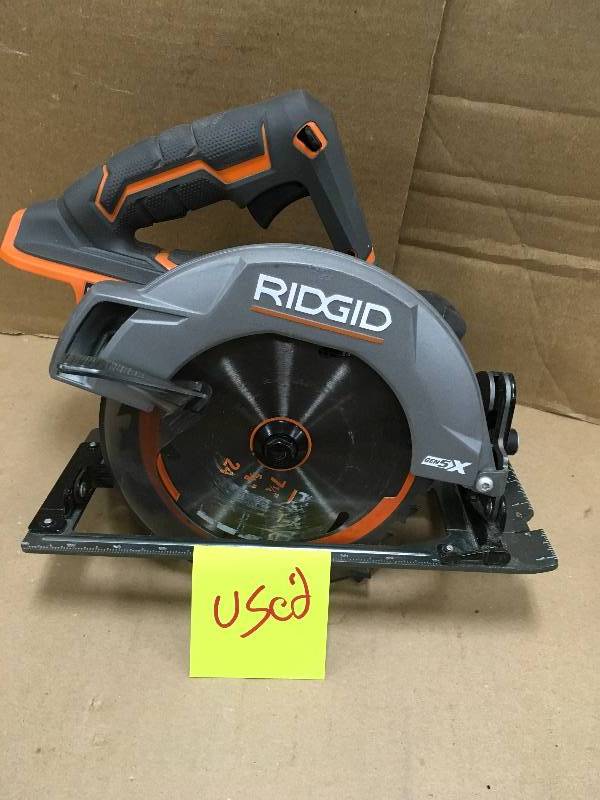 lot 34 image: Ridgid 18-Volt GEN5X Cordless 7-14 in. Circular Saw (Tool-Only) with Blade and Blade Wrench in working condition