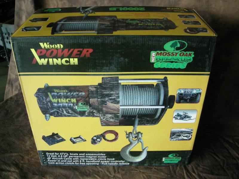 lot 67 image: 2000lb Mossy Oak Wood Power Winch