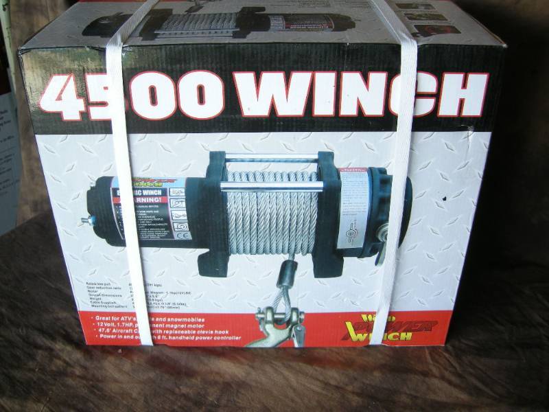 lot 123 image: 4500lb Wood Power Winch