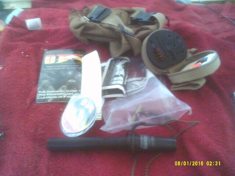 lot 15 image: SHOT GUN CLEANING KIT , GRUNT CALL , FANNY PACK