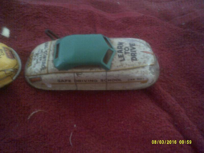 lot 23 image: 2 ANTIQUE WIND UP DERBY CARS