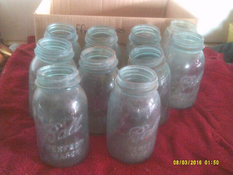 lot 33 image: 10 VINTAGE GREEN BALL JARS