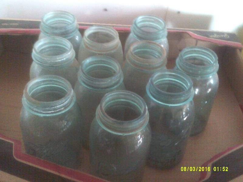 lot 34 image: 10 VINTAGE GREEN BALL JARS