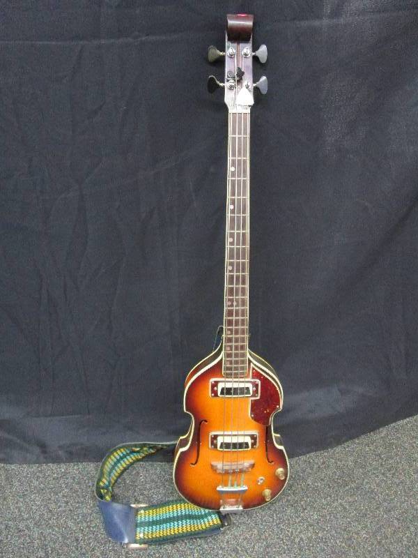 Violin Style 4 String Electric Bass Guitar Sunburst in color