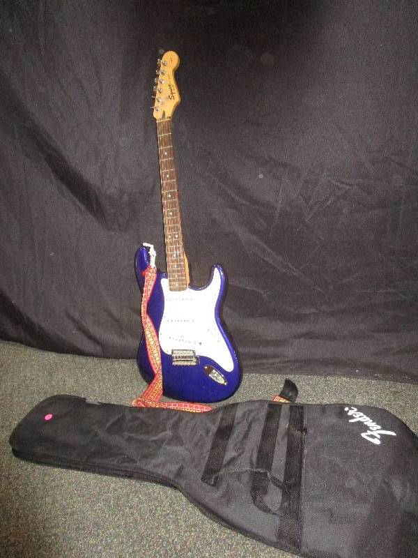 Squier Strat By Fender Guitar and Case