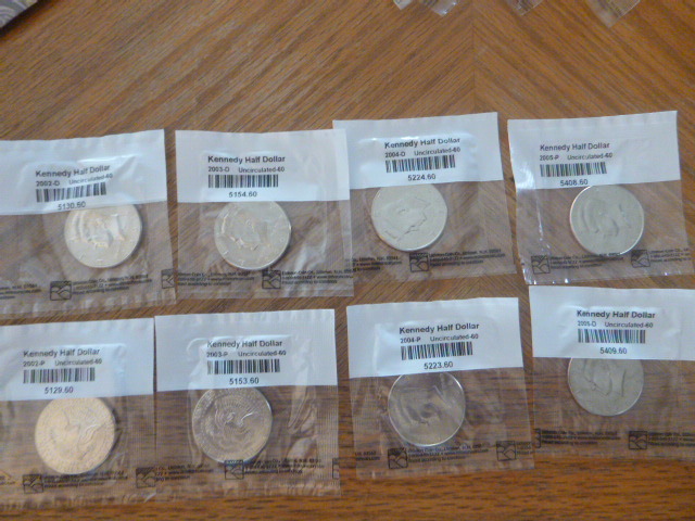 8 Uncirculated Kennedy Half Dollars