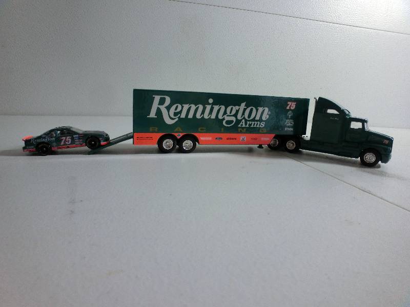 lot 19 image: Remington 164 scale racing transporter die cast