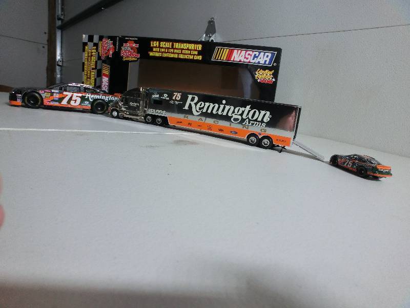 lot 24 image: Remington 164 scale transporter with 164 & 124 scale stock car