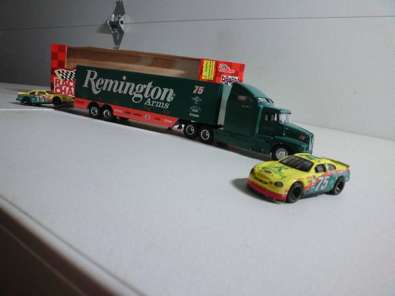 lot 27 image: Remington 164 scale racing transporter die cast