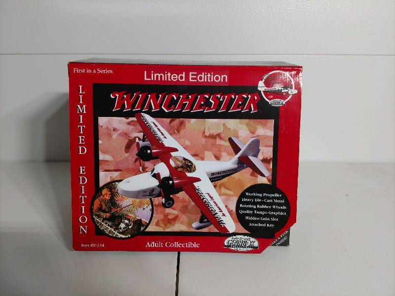 lot 1 image: Die-Cast Metal Winchester Coin Bank