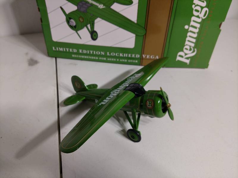 lot 9 image: Remington 1932 Lockheed Vega Die Cast coin bank