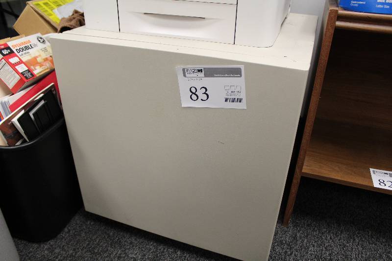 lot 83 image: 1-Door 2-shelf Metal Office Supply Cabinet