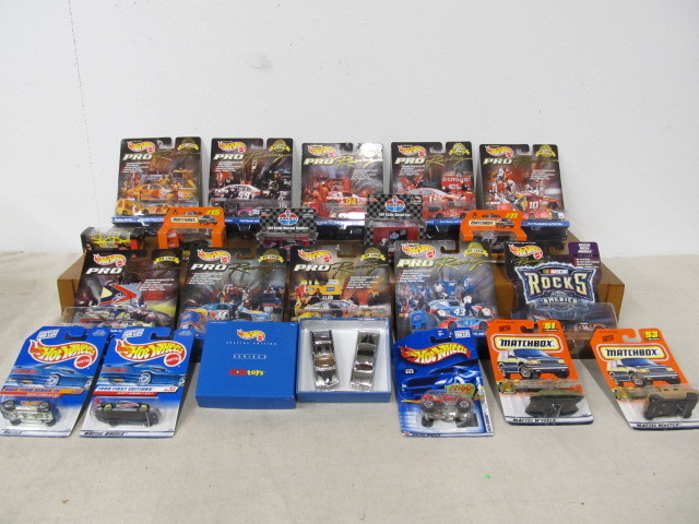 lot 66 image: Large Lot of MINT Brand New Diecast Cars Hot Wheels etc.