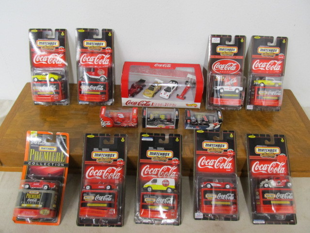 lot 69 image: Large Lot of MINT Brand New COCA COLA  Diecast Cars Matchbox etc.