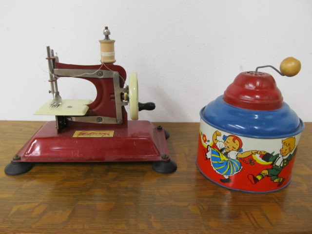 lot 95 image: Vintage Tin Toy Sewing Machine & Noisemaker 
