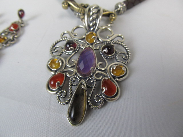 lot 34 image: Sterling Silver Amethyst & Multi Gemstone Pendant Necklace & Earrings