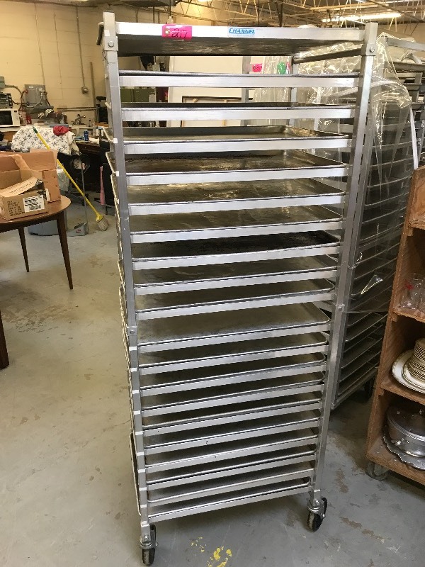 lot 217 image: CHANNEL BAKING TRAY ROLLING RACK WITH TRAYS