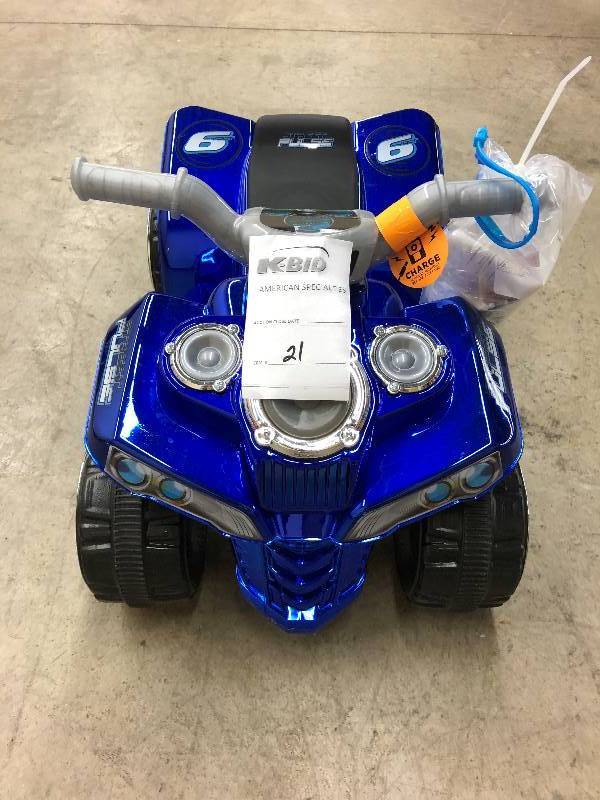 lot 42 image: NEW 6 Volt Blue Pulse Quad Power Wheel