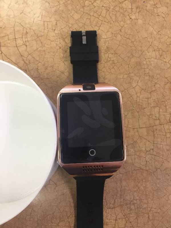 lot 32 image: NEW- Q18 Bluetooth Smart Wrist Watch with Camera (ROSE GOLD)