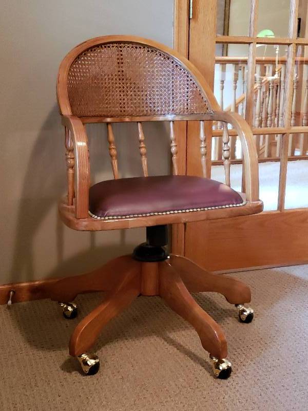 lot 33 image: Oak Cane-backed Office Chair with Exposed Thumb Tacks
