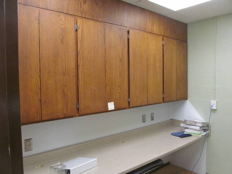 lot 27 image: Kitchen-Wood wall cabinets- Counter