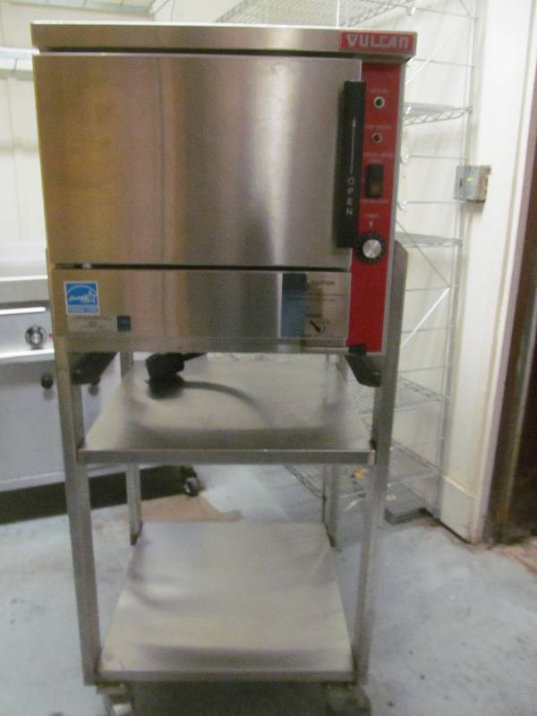lot 37 image: Kitchen-Vulcan Oven- Stainless steel cart wwheels