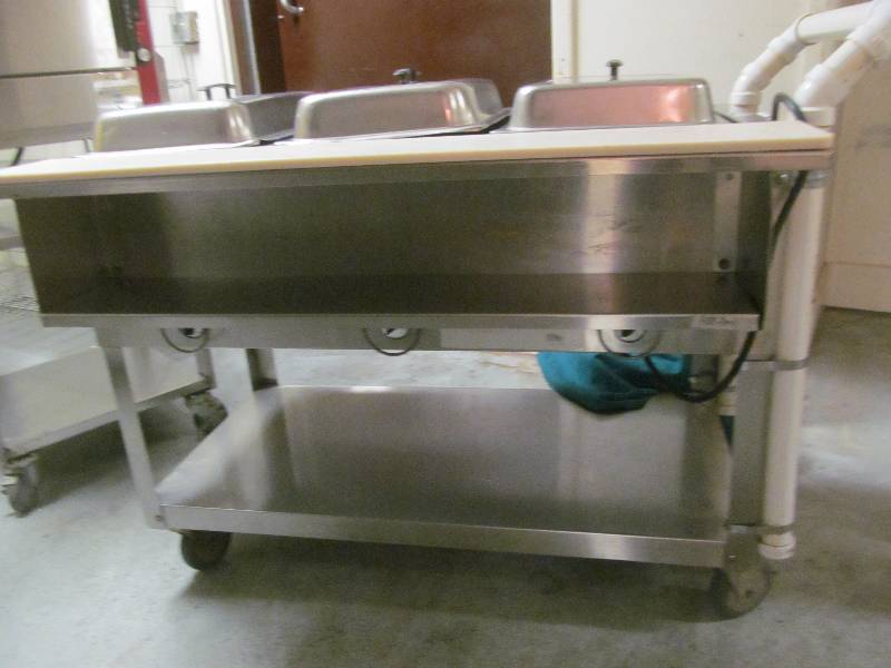 lot 38 image: Kitchen-Warming Buffet Table- Duke Stainless Steel