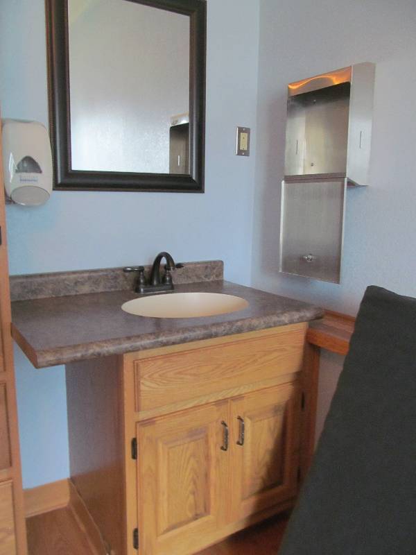 lot 313 image: Special care room-Vanity, mirror, soap and towel dispenser