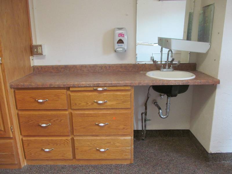 lot 331 image: (Rm 20) Vanity, mirror, towel and soap dispenser, (23x74x31)