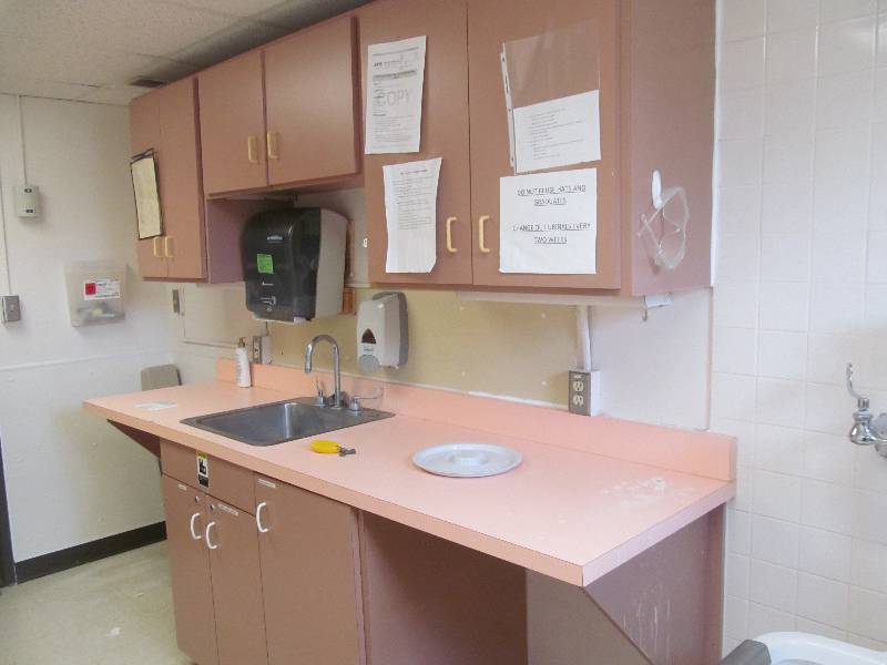 lot 374 image: (Soiled Utility 2) Cabinet, cupboards, sink, soap and towel dispenser (26x96x36)