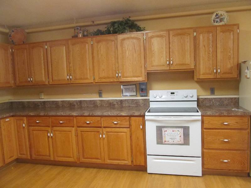 lot 412 image: Cleaning room-Kitchen Cupboards and Counters- Double sink-Hand and towel dispenser- L- Shaped lower